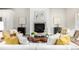 Comfortable living room featuring a fireplace, modern decor and soft seating at 3350 S Eudora St, Denver, CO 80222