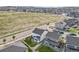 An aerial view of houses with well-kept lawns and neatly arranged layouts at 5446 Coltin Trl, Castle Rock, CO 80104