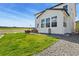 Beautiful backyard with outdoor dining, comfortable seating, and a well-kept lawn at 5446 Coltin Trl, Castle Rock, CO 80104
