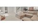 Spacious basement with plush carpeting, a cozy sectional, and a glimpse of a bathroom and exercise equipment at 5446 Coltin Trl, Castle Rock, CO 80104