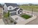Beautiful two-story home with a modern design, landscaped front yard, and attached two-car garage at 5446 Coltin Trl, Castle Rock, CO 80104