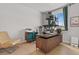 Bright home office with modern desk and decor at 5446 Coltin Trl, Castle Rock, CO 80104