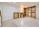 Basement featuring built-in shelving and storage at 9617 Bighorn Way, Littleton, CO 80125