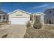 Charming single-Gathering home with a two-car garage and well-maintained front yard at 9617 Bighorn Way, Littleton, CO 80125