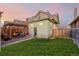 Landscaped backyard with pergola and firepit at 4415 N Clay St, Denver, CO 80211