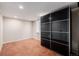 Finished basement with carpeted floor and large closet at 4415 N Clay St, Denver, CO 80211