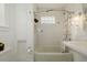 Charming bathroom with a tub and shower combination at 4415 N Clay St, Denver, CO 80211