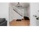 Spacious entryway, hardwood floors, and a view of the staircase at 4415 N Clay St, Denver, CO 80211