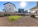 Landscaped backyard featuring a cozy covered patio area, and privacy fencing at 4104 N Picadilly Ct, Aurora, CO 80019