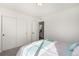 Bedroom showing closet space and access to an ensuite bathroom at 4104 N Picadilly Ct, Aurora, CO 80019