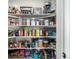 Pantry shelves fully stocked with dry goods and various household staples at 4104 N Picadilly Ct, Aurora, CO 80019