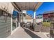 Covered patio with outdoor seating, perfect for relaxing and entertaining at 4104 N Picadilly Ct, Aurora, CO 80019