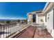 Balcony with a view of the mountains in the distance at 7672 S Ensenada Ct, Centennial, CO 80016