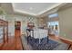 Inviting dining room showcases hardwood floors and seamless access to the living spaces at 7672 S Ensenada Ct, Centennial, CO 80016