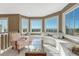 Living room with bench seating near the windows and an arm chair at 7672 S Ensenada Ct, Centennial, CO 80016