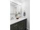 Elegant bathroom with a double sink vanity, marble countertop, and modern fixtures, offering a spa-like experience at 6567 S Elizabeth Way, Centennial, CO 80121