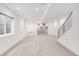 Spacious finished basement featuring carpeted floors, recessed lighting, and a modern staircase at 3333 Osage St, Denver, CO 80211