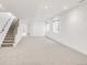 Finished basement with carpet, recessed lighting, and open floor plan at 3333 Osage St, Denver, CO 80211