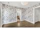 Another view of the stylish bedroom with hardwood floors, lots of light and access to ensuite bath at 3333 Osage St, Denver, CO 80211