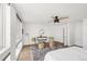 Bright bedroom with ceiling fan, decorative touches, and large windows for natural light at 3333 Osage St, Denver, CO 80211