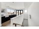 Hallway provides access to a scenic outdoor deck and features a practical built-in counter at 3333 Osage St, Denver, CO 80211