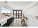 Hallway provides access to an outdoor balcony and features a convenient built-in desk and counter at 3333 Osage St, Denver, CO 80211