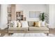 Comfortable living room with stylish shelving, decor, and a comfortable sofa with throw pillows at 3333 Osage St, Denver, CO 80211