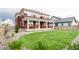 Spacious backyard with a well-maintained lawn, great for outdoor activities and relaxation at 1826 Hickory Ave, Erie, CO 80516