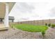 Landscaped backyard with lush lawn, providing a serene outdoor space at 1826 Hickory Ave, Erie, CO 80516