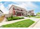 Two-story home with a covered porch, attached garage, and an inviting curb appeal at 1826 Hickory Ave, Erie, CO 80516