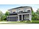 Charming two-story home with a well-manicured lawn and a two-car garage at 1826 Hickory Ave, Erie, CO 80516
