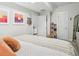 Bright bedroom with ample natural light features a comfortable bed and stylish decor at 208 N Foote Ave, Lafayette, CO 80026