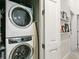 Convenient laundry area with stacked washer and dryer, maximizing space efficiency and functionality at 208 N Foote Ave, Lafayette, CO 80026