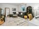 Spacious living room featuring comfortable seating, stylish decor, and ample natural light for a relaxing ambiance at 208 N Foote Ave, Lafayette, CO 80026