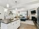 Bright, open living space with modern kitchen and comfortable living area at 208 N Foote Ave, Lafayette, CO 80026