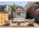 Spacious backyard with outdoor seating and a fire pit, perfect for entertaining at 321 Fox St, Denver, CO 80223