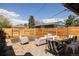 Expansive backyard featuring a patio, deck, and privacy fence, great for outdoor activities at 321 Fox St, Denver, CO 80223