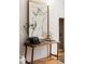 Well-decorated desk area featuring natural light, hard wood floors, and stylish decor at 321 Fox St, Denver, CO 80223