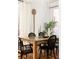 Bright dining room with hardwood floors, large windows, wooden table and chairs at 321 Fox St, Denver, CO 80223