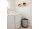 Functional laundry room with modern appliances and storage space at 321 Fox St, Denver, CO 80223