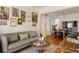 Inviting living room showcasing an open layout, hardwood floors, comfortable seating, and stylish accents at 321 Fox St, Denver, CO 80223