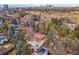 Aerial view showing home, pool, and surrounding neighborhood at 2111 E Alameda Ave, Denver, CO 80209