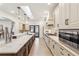 Modern kitchen with two islands, stainless steel appliances, and plenty of natural light at 2111 E Alameda Ave, Denver, CO 80209