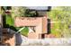 Aerial view of a well-maintained home with lush landscaping and an inviting outdoor patio space at 2520 S Race St, Denver, CO 80210