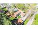 Areal view of a single-Gathering home with a wooden deck and a well-maintained green yard at 2520 S Race St, Denver, CO 80210