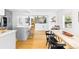 Open concept kitchen featuring a breakfast bar, dining area, and easy access to the living spaces at 2520 S Race St, Denver, CO 80210