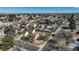 Expansive aerial view of a suburban neighborhood highlighting rooftops and tree cover in a well-established community at 19000 E Mansfield Dr, Aurora, CO 80013