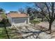 Spacious garage with an extended driveway and landscaping; a great home exterior at 19000 E Mansfield Dr, Aurora, CO 80013