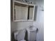 The bathroom features a vanity with mirror and toilet at 15003 Olmsted Dr, Denver, CO 80239