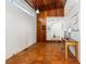 Bright foyer with tiled floor, wood paneling, leading to the main house at 1723 E 16Th Ave, Denver, CO 80218